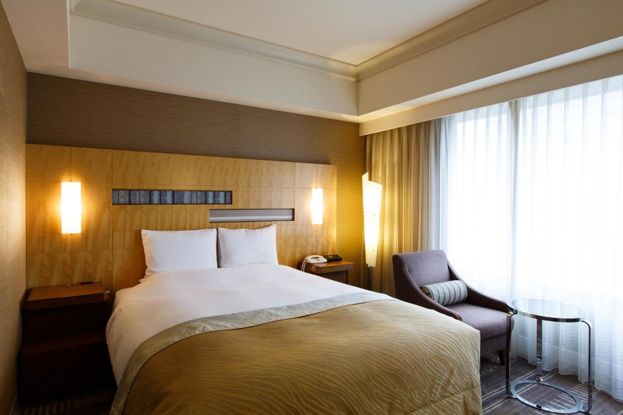 فندق أوكروا فوكوكا الغرفة الصورة A room at the hotel