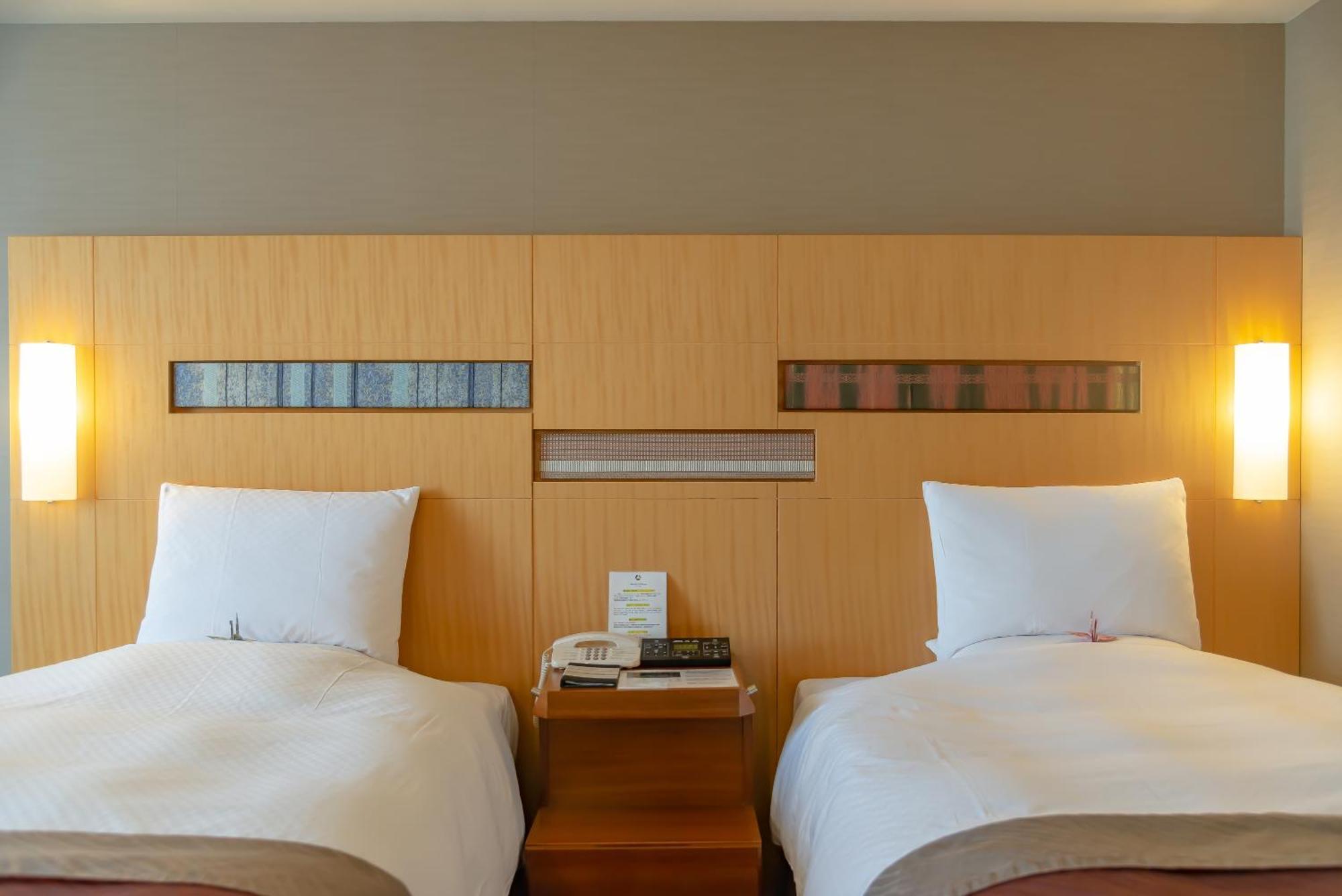 فندق أوكروا فوكوكا الغرفة الصورة A room at the hotel