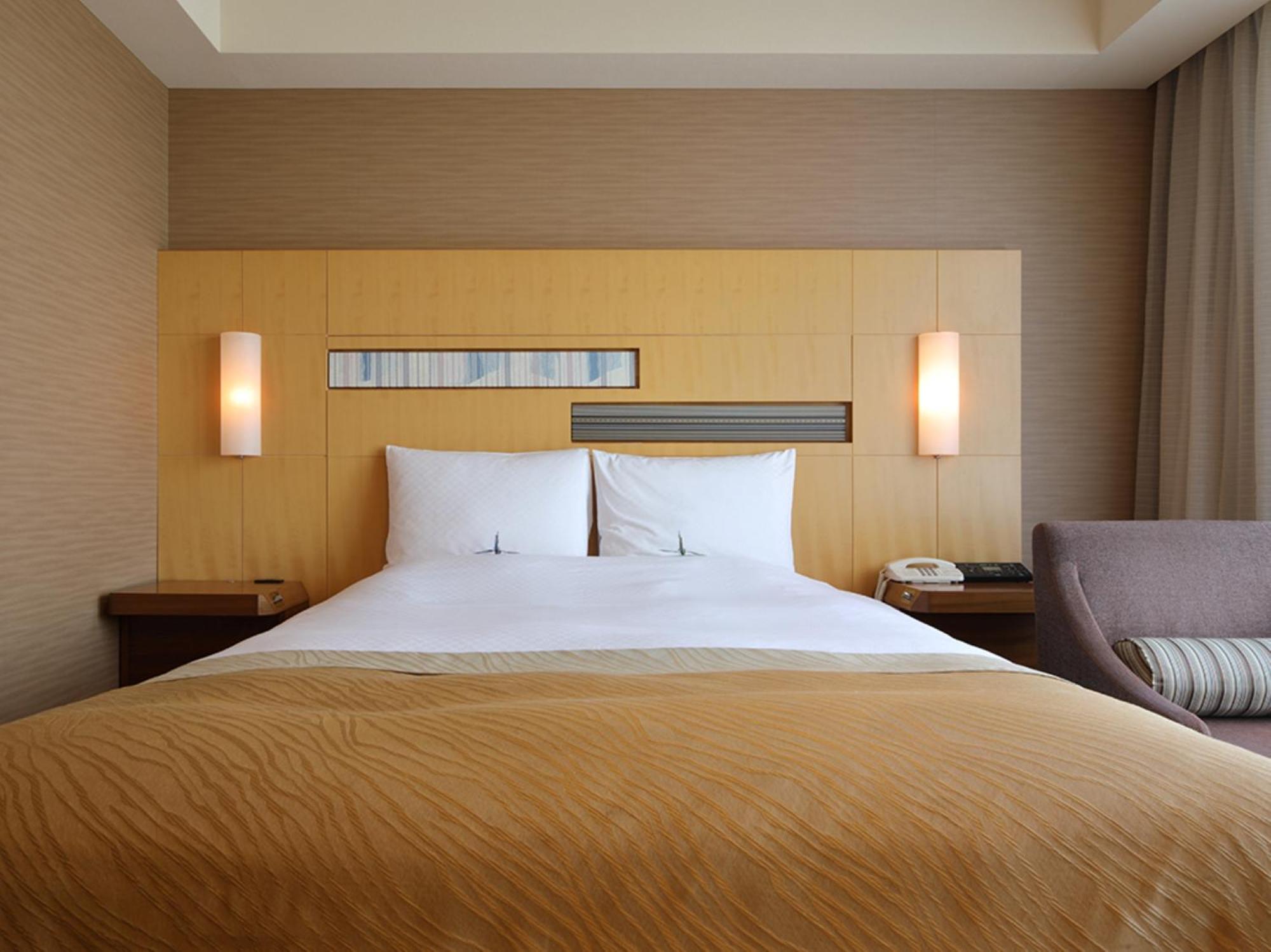 فندق أوكروا فوكوكا المظهر الخارجي الصورة A bedroom